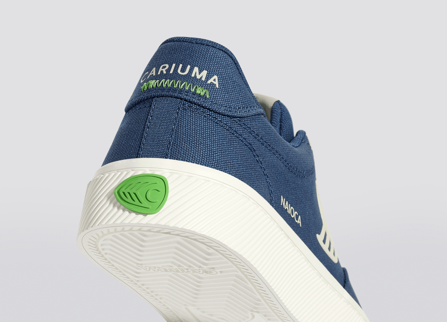 NAIOCA Canvas Shadow Blue Canvas Ivory Logo